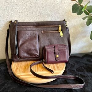 Fossil crossbody with mini wallet, deep purple in color.